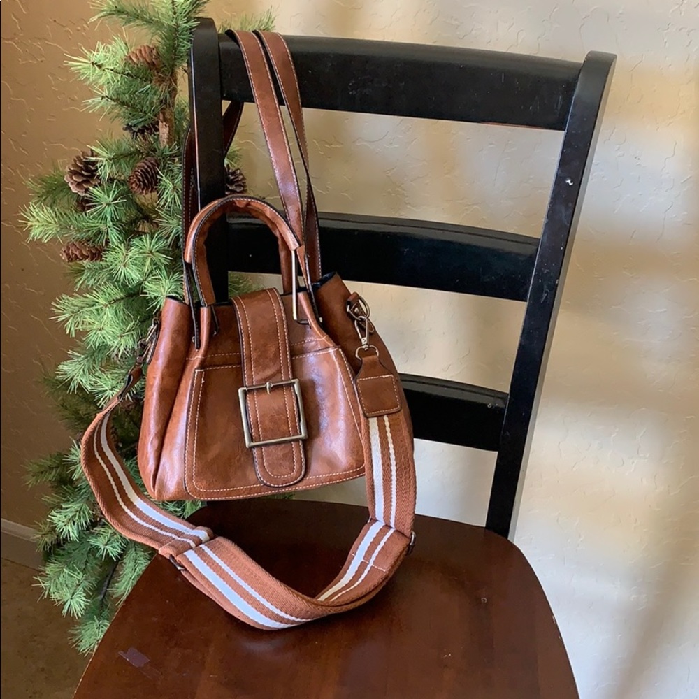 Free w/ any purchase Small handbag. GUC